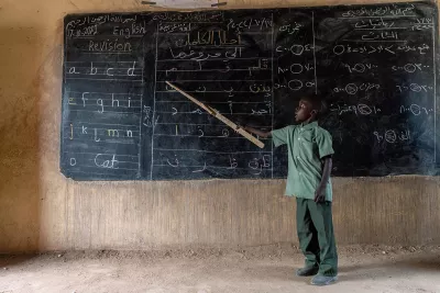A boy student participates in class in Khartoum, Sudan.